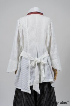Highlands Shirt in White Clapboard Weave; Fairholme Necktie in Red Door Washed Cotton; Montague Trousers in Lakeland Woven Stripe. By Ivey Abitz