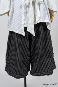 Highlands Shirt in White Clapboard Weave; Fairholme Necktie in Red Door Washed Cotton; Montague Trousers in Lakeland Woven Stripe. By Ivey Abitz
