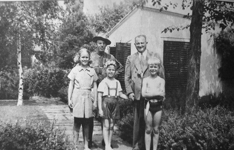 Shirley Temple visits Eleanor at Val-Kill Cottage. Standing just outside loggia behind Stone Cottage. Hyde Park, New York. Photograph courtesy National Park Service.