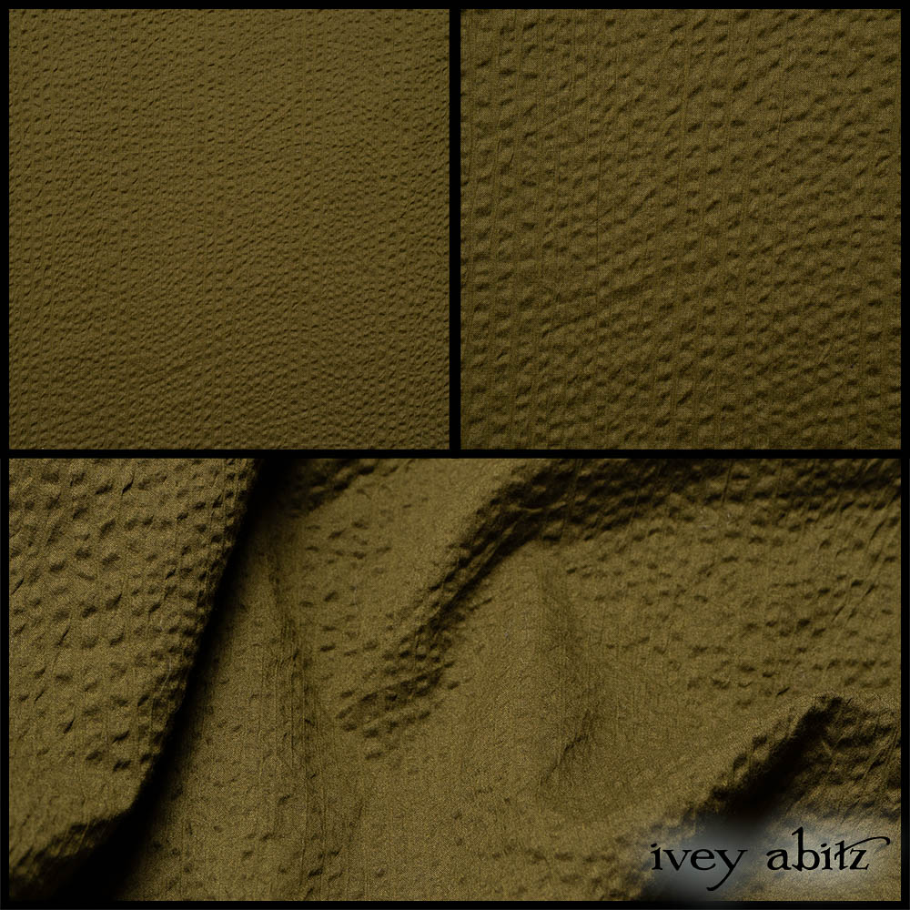 Description: We cannot get enough of our Idyllic Green hued weaves. They represent eternal hopefulness. We can all use some of that in everyday life, can we not? This weave is light as air, soft, and easy to wear. Do you travel often? Or work long days? You will love this one then. It has a puckered effect, so it embraces texture and already has a natural wrinkled effect into it. Play it up by spritzing the garment and twisting it. Play it down by spritzing the garment and smoothing it out. It is relevant for most of our designs, so plan on an entire mixing and matching group of a shirt, duster, and frock in this gloriously versatile weave. Content: 100 percent cotton. Woven in Europe. Four season weave. Care: Simply hand wash or put through machine delicate cycle in cold water with a plant based detergent. We suggest using a natural fabric softener to maintain the softness we have washed into it. Tumble dry on extra-low heat for just a few minutes with our artisan wool dryer balls to keep the relaxed effect that is featured in the Look Book.