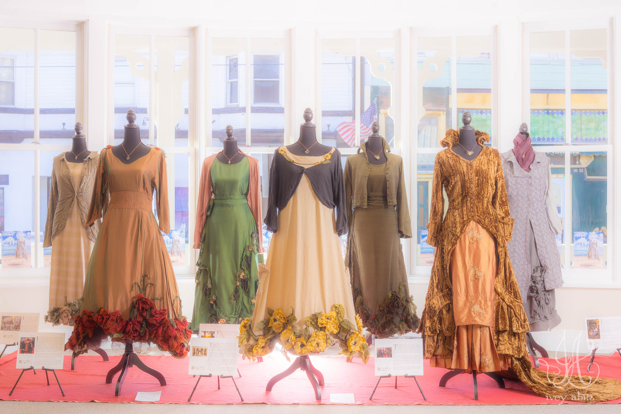 A view of the 20 year retrospective exhibit featuring Ivey Abitz ensembles on dress forms.