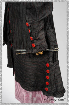 Pierrepont Duster Coat in Beacon Black and Red Pin Tuck Twill; Viv Frock in Red Sky at Night Stripe. Ivey Abitz bespoke clothing.
