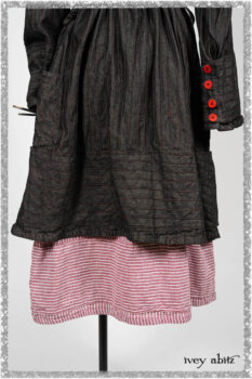 Pierrepont Duster Coat in Beacon Black and Red Pin Tuck Twill; Viv Frock in Red Sky at Night Stripe. Ivey Abitz bespoke clothing.