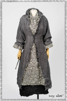 Bartholomew Duster Coat in Black White Painted Puckery Weave; Clotaire Sash in Ethereal Cream and Black Fleur Stretch Cotton; Tollie Dress in Ethereal Cream and Black Fleur Stretch Cotton; Mewland Skirt in Black Washed Crinkled Linen. Ivey Abitz bespoke clothing.