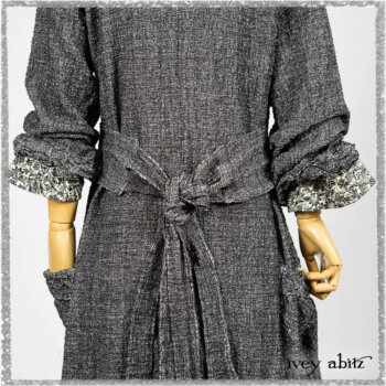 Bartholomew Duster Coat in Black White Painted Puckery Weave; Clotaire Sash in Ethereal Cream and Black Fleur Stretch Cotton; Tollie Dress in Ethereal Cream and Black Fleur Stretch Cotton; Mewland Skirt in Black Washed Crinkled Linen. Ivey Abitz bespoke clothing.