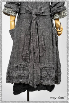 Bartholomew Duster Coat in Black White Painted Puckery Weave; Clotaire Sash in Ethereal Cream and Black Fleur Stretch Cotton; Tollie Dress in Ethereal Cream and Black Fleur Stretch Cotton; Mewland Skirt in Black Washed Crinkled Linen. Ivey Abitz bespoke clothing.