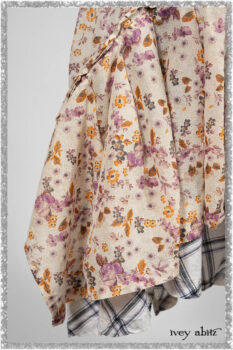 Elliot Jacket in Ethereal Cream Floral Knit; Fairholme Dress in Ethereal Floral Cotton Voile; Fairholme Sash in Ethereal Floral Cotton Voile; Fairholme Frock in Plum Tree Wispy Plaid Cotton. Ivey Abitz bespoke clothing.