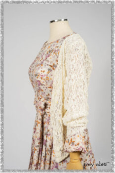 Elliot Jacket in Ethereal Cream Floral Knit; Fairholme Dress in Ethereal Floral Cotton Voile; Fairholme Sash in Ethereal Floral Cotton Voile; Fairholme Frock in Plum Tree Wispy Plaid Cotton. Ivey Abitz bespoke clothing.