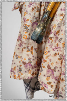 Elliot Jacket in Ethereal Cream Floral Knit; Fairholme Dress in Ethereal Floral Cotton Voile; Fairholme Sash in Ethereal Floral Cotton Voile; Fairholme Frock in Plum Tree Wispy Plaid Cotton. Ivey Abitz bespoke clothing.