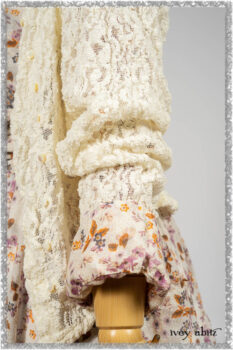 Elliot Jacket in Ethereal Cream Floral Knit; Fairholme Dress in Ethereal Floral Cotton Voile; Fairholme Sash in Ethereal Floral Cotton Voile; Fairholme Frock in Plum Tree Wispy Plaid Cotton. Ivey Abitz bespoke clothing.