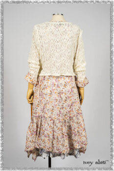 Elliot Jacket in Ethereal Cream Floral Knit; Fairholme Dress in Ethereal Floral Cotton Voile; Fairholme Sash in Ethereal Floral Cotton Voile; Fairholme Frock in Plum Tree Wispy Plaid Cotton. Ivey Abitz bespoke clothing.