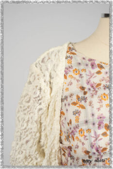 Elliot Jacket in Ethereal Cream Floral Knit; Fairholme Dress in Ethereal Floral Cotton Voile; Fairholme Sash in Ethereal Floral Cotton Voile; Fairholme Frock in Plum Tree Wispy Plaid Cotton. Ivey Abitz bespoke clothing.