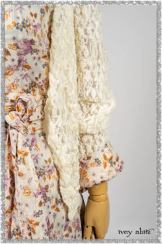 Elliot Jacket in Ethereal Cream Floral Knit; Fairholme Dress in Ethereal Floral Cotton Voile; Fairholme Sash in Ethereal Floral Cotton Voile; Fairholme Frock in Plum Tree Wispy Plaid Cotton. Ivey Abitz bespoke clothing.