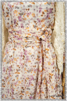 Elliot Jacket in Ethereal Cream Floral Knit; Fairholme Dress in Ethereal Floral Cotton Voile; Fairholme Sash in Ethereal Floral Cotton Voile; Fairholme Frock in Plum Tree Wispy Plaid Cotton. Ivey Abitz bespoke clothing.