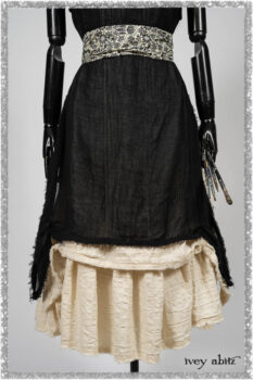 Ardsley Frock Beacon Black Hemstitch Stripe Gauze; Ardsleydale Frock in Ethereal Cream Embroidered Crushed Plaid; Clotaire Sash in Ethereal Cream and Black Fleur Stretch Cotton. Ivey Abitz bespoke clothing.