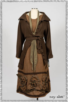 Porte Cochere Jacket in Earthen Ribbed Weave; Saint Ans Frock in Chestnut Tree Wondrous Washed Linen with handsculpted details in rare weaves; Saint Ans Sash in Woodlawn Melange Knit. Ivey Abitz bespoke clothing.