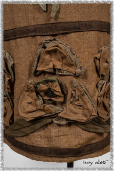Porte Cochere Jacket in Earthen Ribbed Weave; Saint Ans Frock in Chestnut Tree Wondrous Washed Linen with handsculpted details in rare weaves; Saint Ans Sash in Woodlawn Melange Knit. Ivey Abitz bespoke clothing.