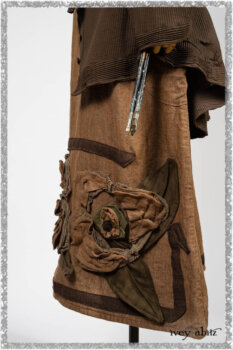Porte Cochere Jacket in Earthen Ribbed Weave; Saint Ans Frock in Chestnut Tree Wondrous Washed Linen with handsculpted details in rare weaves; Saint Ans Sash in Woodlawn Melange Knit. Ivey Abitz bespoke clothing.