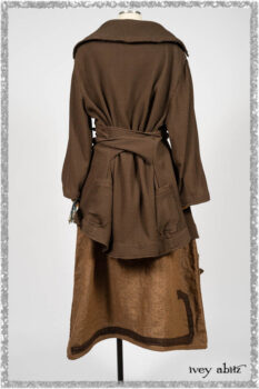 Porte Cochere Jacket in Earthen Ribbed Weave; Saint Ans Frock in Chestnut Tree Wondrous Washed Linen with handsculpted details in rare weaves; Saint Ans Sash in Woodlawn Melange Knit. Ivey Abitz bespoke clothing.
