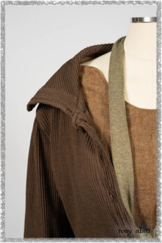 Porte Cochere Jacket in Earthen Ribbed Weave; Saint Ans Frock in Chestnut Tree Wondrous Washed Linen with handsculpted details in rare weaves; Saint Ans Sash in Woodlawn Melange Knit. Ivey Abitz bespoke clothing.