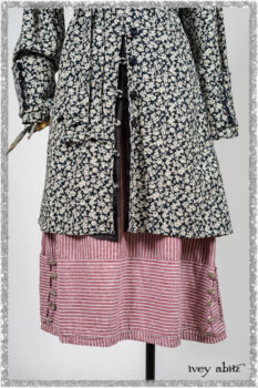 Viv Coat Dress in National Seashore Floral Jacquard; Pierrepont Sash in National Seashore Pinstripe Voile; Viv Frock in Red Sky at Night Stripe. Ivey Abitz bespoke clothing.