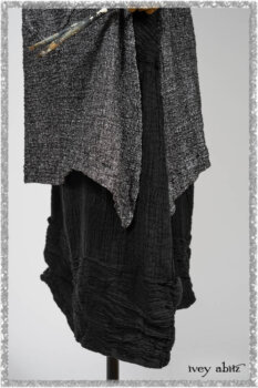 Elliot Jacket in Beacon Flora and Fauna Knit; Bramley Overlay in Black White Painted Puckery Weave; Clotaire Sash in Red Sky at Night Yarn Dyed Weave; Mewland Skirt in Black Washed Crinkled Linen. Ivey Abitz bespoke clothing.