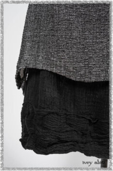 Elliot Jacket in Beacon Flora and Fauna Knit; Bramley Overlay in Black White Painted Puckery Weave; Clotaire Sash in Red Sky at Night Yarn Dyed Weave; Mewland Skirt in Black Washed Crinkled Linen. Ivey Abitz bespoke clothing.
