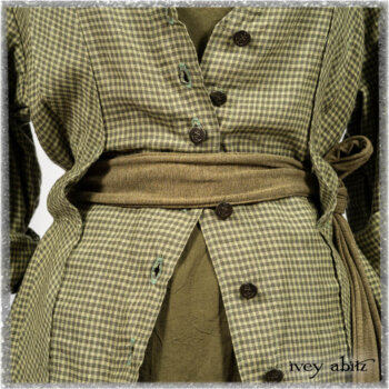 Vanetten Duster Coat in Seagrass Petite Check Linen; Saint Ans Sash in Woodlawn Melange Knit; Saint Ans Frock in Seagrass Crushed Cotton with mix of sculptural details created in rare weaves. Ivey Abitz bespoke clothing.