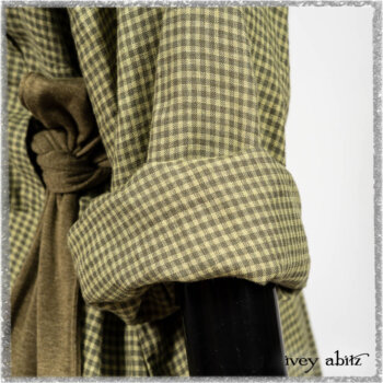 Vanetten Duster Coat in Seagrass Petite Check Linen; Saint Ans Sash in Woodlawn Melange Knit; Saint Ans Frock in Seagrass Crushed Cotton with mix of sculptural details created in rare weaves. Ivey Abitz bespoke clothing.