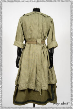 Vanetten Duster Coat in Seagrass Petite Check Linen; Saint Ans Sash in Woodlawn Melange Knit; Saint Ans Frock in Seagrass Crushed Cotton with mix of sculptural details created in rare weaves. Ivey Abitz bespoke clothing.
