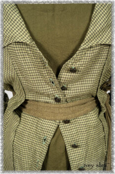Vanetten Duster Coat in Seagrass Petite Check Linen; Saint Ans Sash in Woodlawn Melange Knit; Saint Ans Frock in Seagrass Crushed Cotton with mix of sculptural details created in rare weaves. Ivey Abitz bespoke clothing.