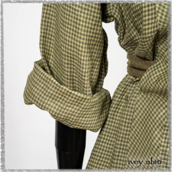 Vanetten Duster Coat in Seagrass Petite Check Linen; Saint Ans Sash in Woodlawn Melange Knit; Saint Ans Frock in Seagrass Crushed Cotton with mix of sculptural details created in rare weaves. Ivey Abitz bespoke clothing.