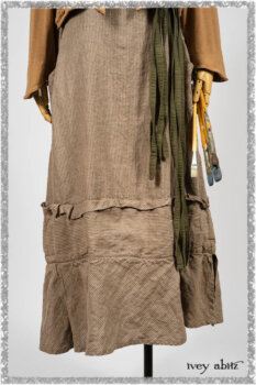 Saint Ans Jacket in Chestnut Tree Melange Knit; Porte Cochere Sash in Seagrass Crushed Knit; Hudson Frock in Earthen Washed Stripe Linen. Ivey Abitz bespoke clothing.