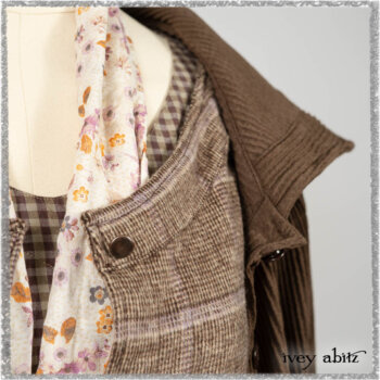 Porte Cochere Shirt Jacket in Earthen Ribbed Weave; Fairholme Sash in Ethereal Floral Cotton Voile; Porte Cochere Frock in Earthen and Plum Stretch Plaid; Gabled Frock in Plum Tree and Woodlawn Check Cotton. Ivey Abitz bespoke clothing.