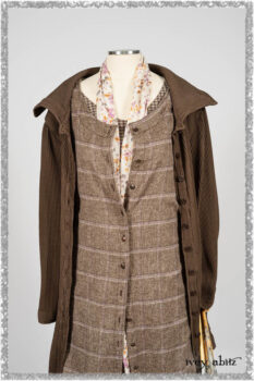 Porte Cochere Shirt Jacket in Earthen Ribbed Weave; Fairholme Sash in Ethereal Floral Cotton Voile; Porte Cochere Frock in Earthen and Plum Stretch Plaid; Gabled Frock in Plum Tree and Woodlawn Check Cotton. Ivey Abitz bespoke clothing.