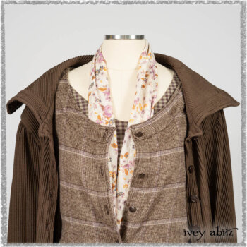 Porte Cochere Shirt Jacket in Earthen Ribbed Weave; Fairholme Sash in Ethereal Floral Cotton Voile; Porte Cochere Frock in Earthen and Plum Stretch Plaid; Gabled Frock in Plum Tree and Woodlawn Check Cotton. Ivey Abitz bespoke clothing.