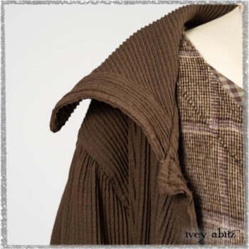 Porte Cochere Shirt Jacket in Earthen Ribbed Weave; Fairholme Sash in Ethereal Floral Cotton Voile; Porte Cochere Frock in Earthen and Plum Stretch Plaid; Gabled Frock in Plum Tree and Woodlawn Check Cotton. Ivey Abitz bespoke clothing.