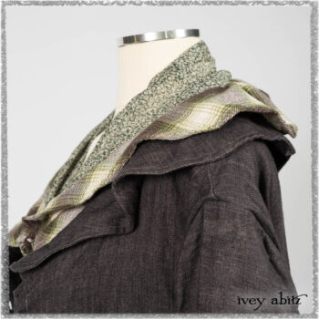 Chevallier Duster Coat in Anchor Grey Wondrous Washed Linen; Chevallier Vest in Seagrass and Anchor Grey Soft Plaid Cotton; Chevallier Trousers in Seagrass Herringbone Twill. Ivey Abitz bespoke clothing.