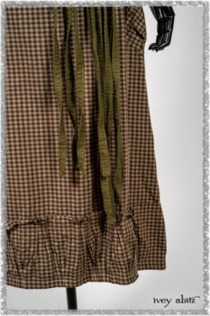 Saint Ans Jacket in Woodlawn Melange Knit; Porte Cochere Sash in Seagrass Crushed Cotton; Gabled Frock in Plum Tree and Woodlawn Check Cotton. Ivey Abitz bespoke clothing.