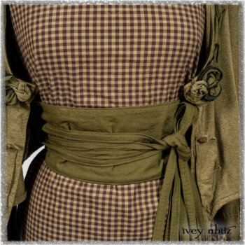 Saint Ans Jacket in Woodlawn Melange Knit; Porte Cochere Sash in Seagrass Crushed Cotton; Gabled Frock in Plum Tree and Woodlawn Check Cotton. Ivey Abitz bespoke clothing.
