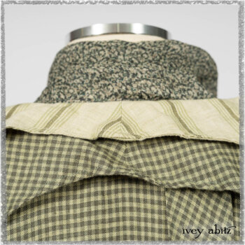 Vanetten Duster Coat in Seagrass Petite Check Linen; Blanchefleur Sash in Pointillism Silk Chiffon; Vanetten Frock in Seagrass Washed Stripe Linen. Ivey Abitz bespoke clothing.