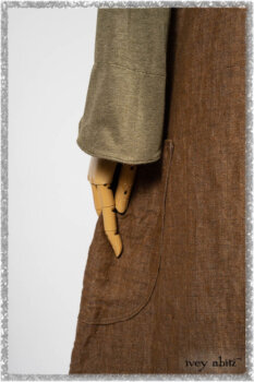 Saint Ans jacket in Woodlawn Melange Knit; Saint Ans Frock in Chestnut Tree Wondrous Washed Linen with mix of sculptural details in rare weaves. Ivey Abitz bespoke clothing.