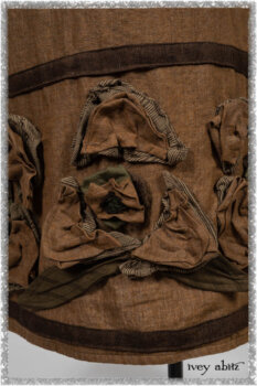 Saint Ans jacket in Woodlawn Melange Knit; Saint Ans Frock in Chestnut Tree Wondrous Washed Linen with mix of sculptural details in rare weaves. Ivey Abitz bespoke clothing.