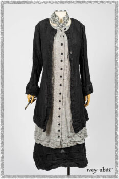 Mewland Jacket in Black Washed Crinkled Linen; Clotaire Sash in Ethereal Cream and Black Fleur Stretch Cotton; Mewland Vest in Beacon Black Embroidered Plaid on Petite Stripe; Mewland Skirt in Black Washed Crinkled Linen. Ivey Abitz bespoke clothing.