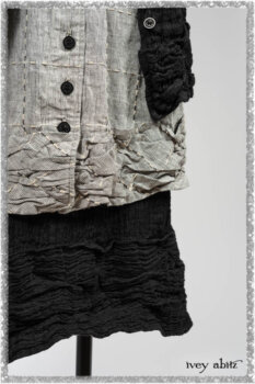 Mewland Jacket in Black Washed Crinkled Linen; Clotaire Sash in Ethereal Cream and Black Fleur Stretch Cotton; Mewland Vest in Beacon Black Embroidered Plaid on Petite Stripe; Mewland Skirt in Black Washed Crinkled Linen. Ivey Abitz bespoke clothing.