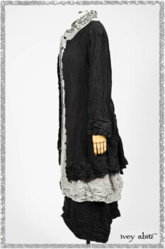 Mewland Jacket in Black Washed Crinkled Linen; Clotaire Sash in Ethereal Cream and Black Fleur Stretch Cotton; Mewland Vest in Beacon Black Embroidered Plaid on Petite Stripe; Mewland Skirt in Black Washed Crinkled Linen. Ivey Abitz bespoke clothing.