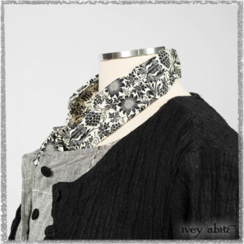 Mewland Jacket in Black Washed Crinkled Linen; Clotaire Sash in Ethereal Cream and Black Fleur Stretch Cotton; Mewland Vest in Beacon Black Embroidered Plaid on Petite Stripe; Mewland Skirt in Black Washed Crinkled Linen. Ivey Abitz bespoke clothing.