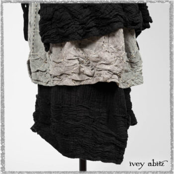 Mewland Jacket in Black Washed Crinkled Linen; Clotaire Sash in Ethereal Cream and Black Fleur Stretch Cotton; Mewland Vest in Beacon Black Embroidered Plaid on Petite Stripe; Mewland Skirt in Black Washed Crinkled Linen. Ivey Abitz bespoke clothing.