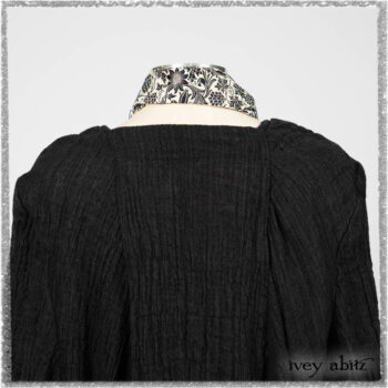 Mewland Jacket in Black Washed Crinkled Linen; Clotaire Sash in Ethereal Cream and Black Fleur Stretch Cotton; Mewland Vest in Beacon Black Embroidered Plaid on Petite Stripe; Mewland Skirt in Black Washed Crinkled Linen. Ivey Abitz bespoke clothing.
