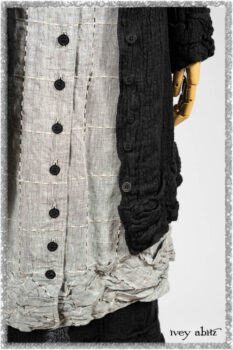 Mewland Jacket in Black Washed Crinkled Linen; Clotaire Sash in Ethereal Cream and Black Fleur Stretch Cotton; Mewland Vest in Beacon Black Embroidered Plaid on Petite Stripe; Mewland Skirt in Black Washed Crinkled Linen. Ivey Abitz bespoke clothing.